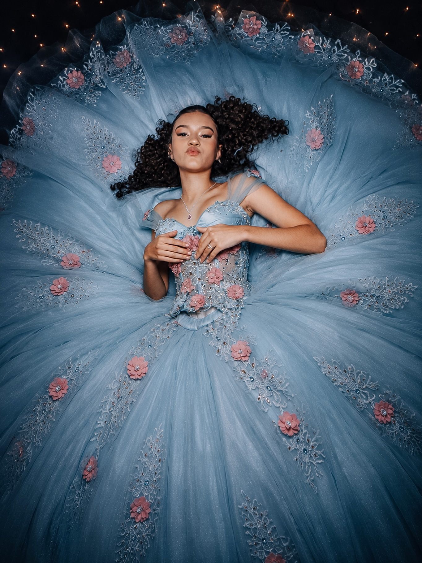 Retrato de debutante com vestido azul